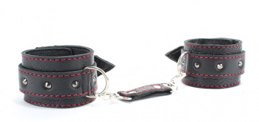 Черные оковы с шипами и контрастной строчкой - БДСМ Арсенал - купить с доставкой в Воронеже